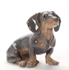 Арт-студия "Кентавр" -  Фарфоровая статуэтка собаки породы такса. №011103